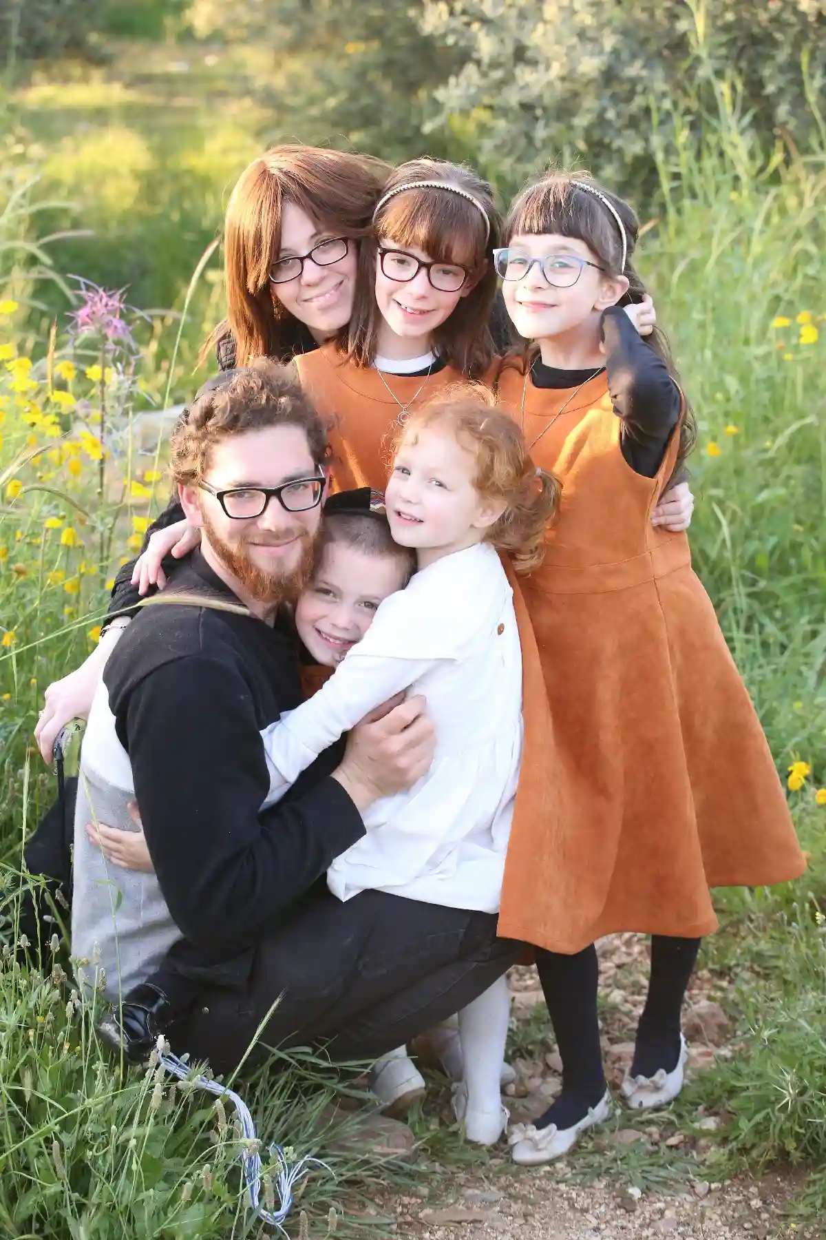 happy family in field kobi studio